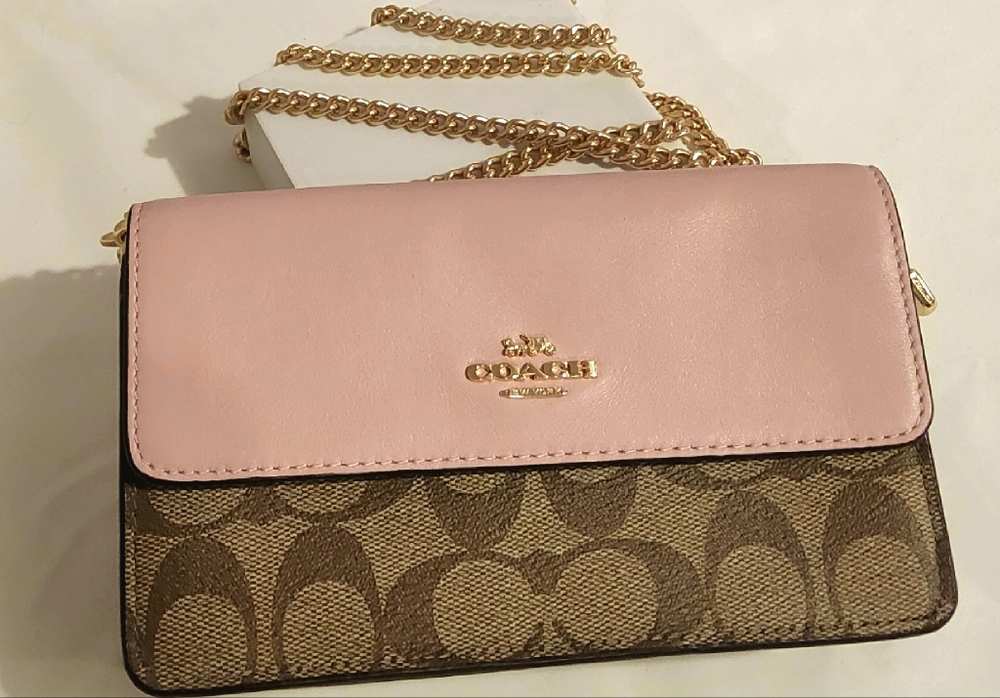 Sold— Coach Clutch NWT
